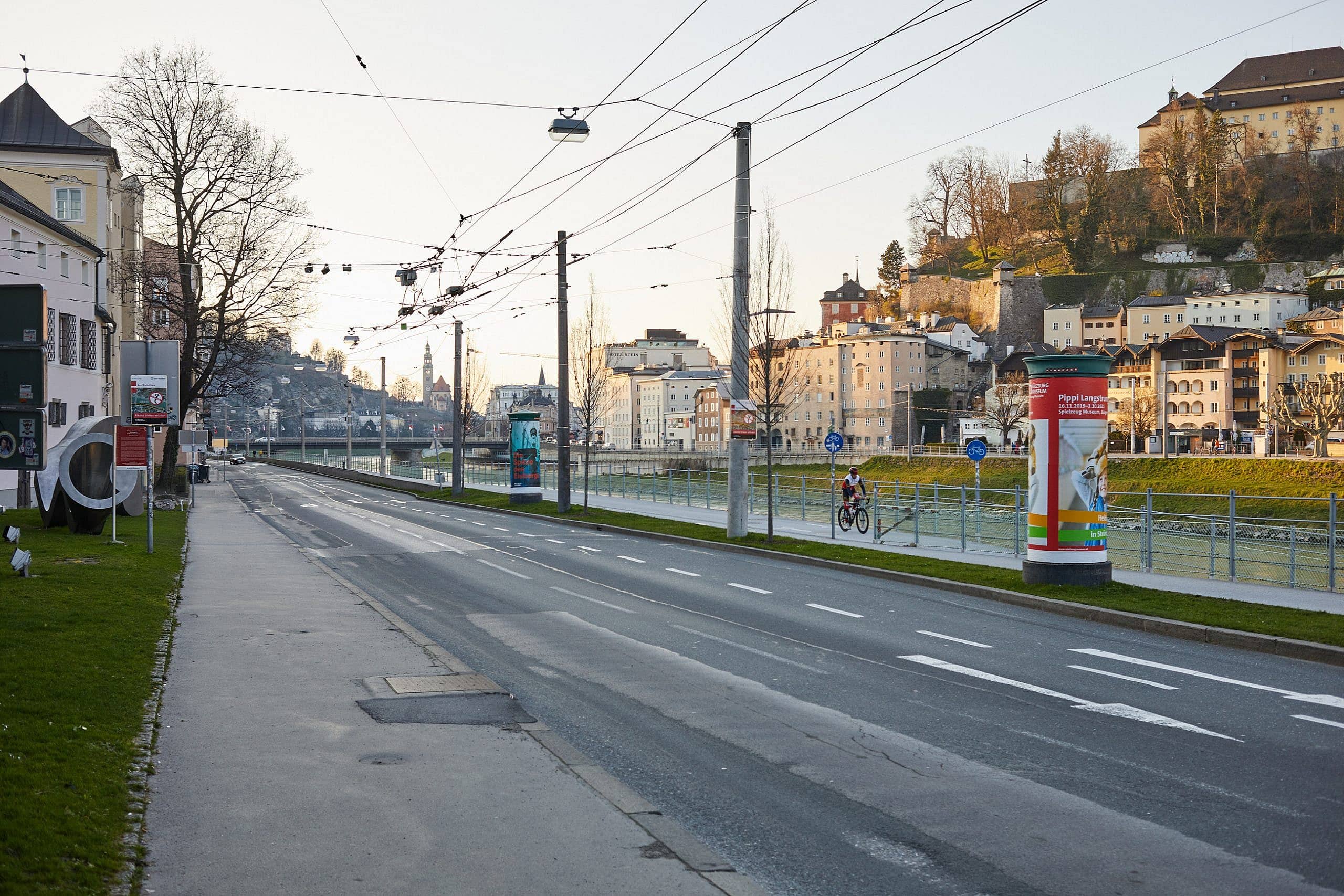 A photograph showing the empty Streets of Salzburg, Rudolfskai