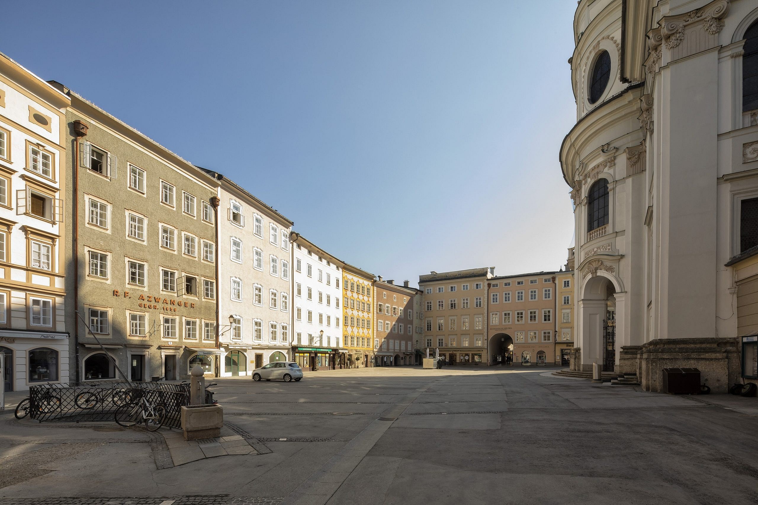 Photograph of an empty Universitätplatz Salzburg