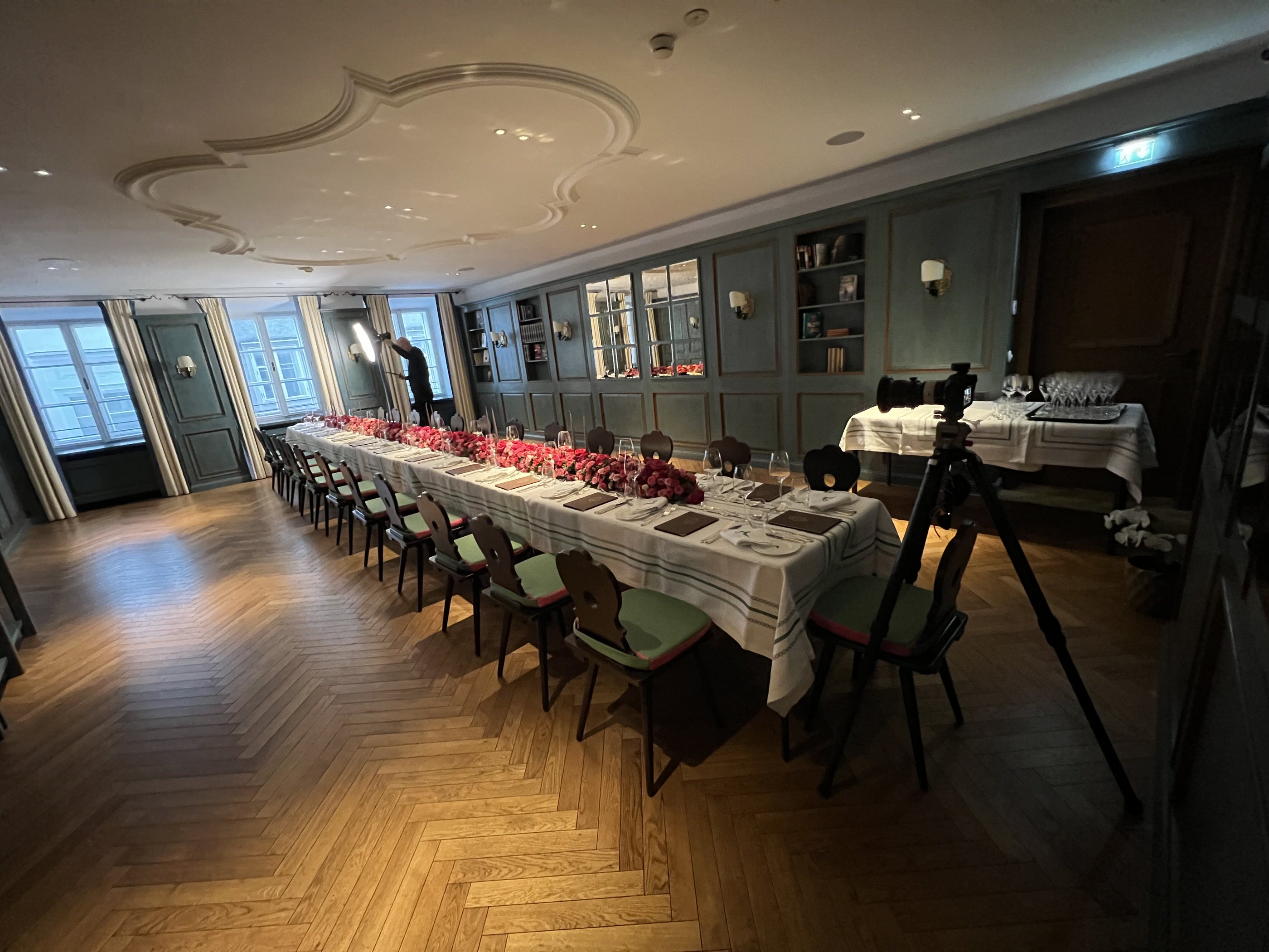 Behind-the-scenes setup for private dining photography in the Bibliothek room, Hotel Goldener Hirsch Salzburg. From the When time is tight blog.