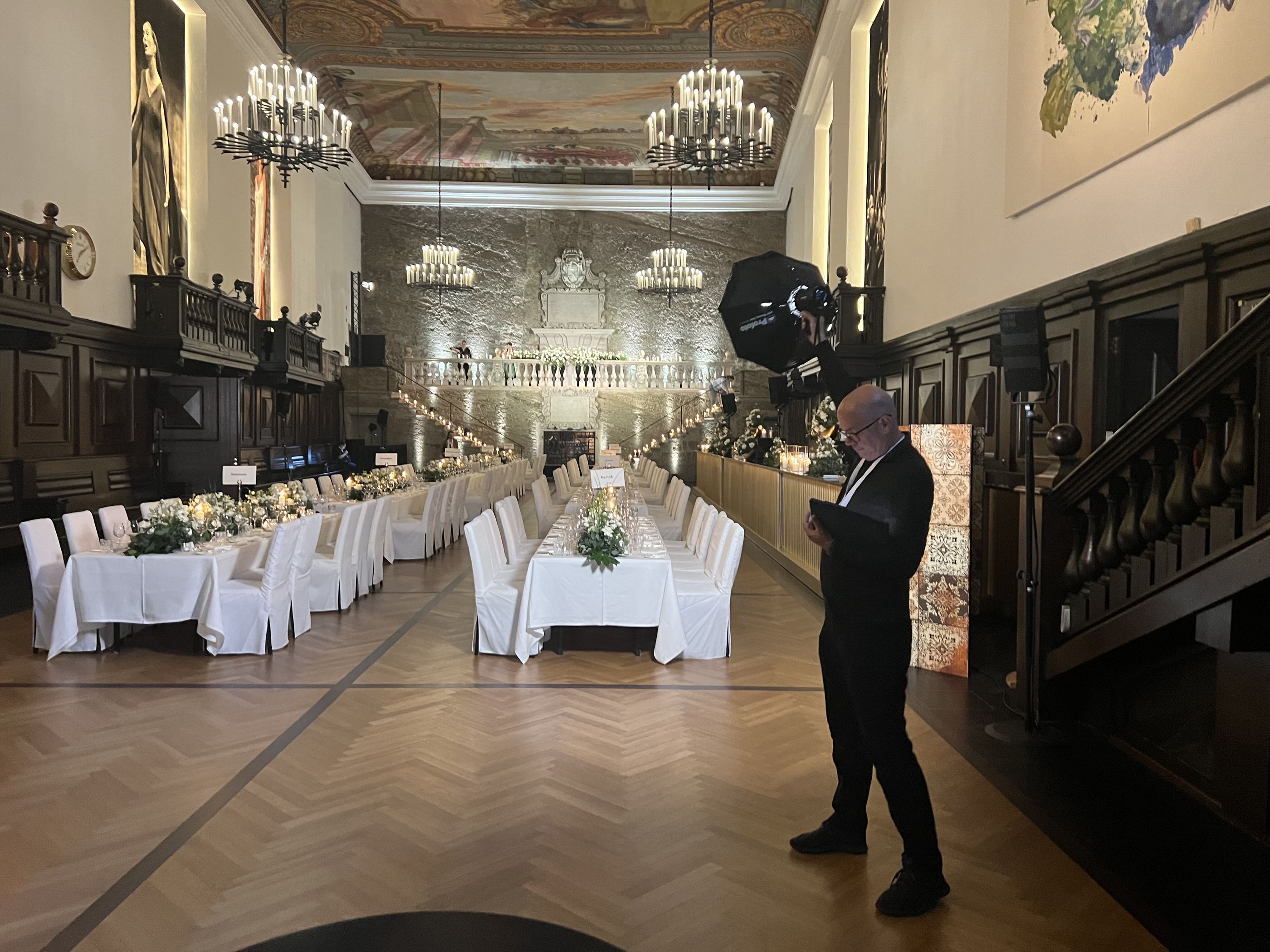 Behind-the-scenes moment during luxury hotel event photography at the Karl Böhm Saal in Salzburg.