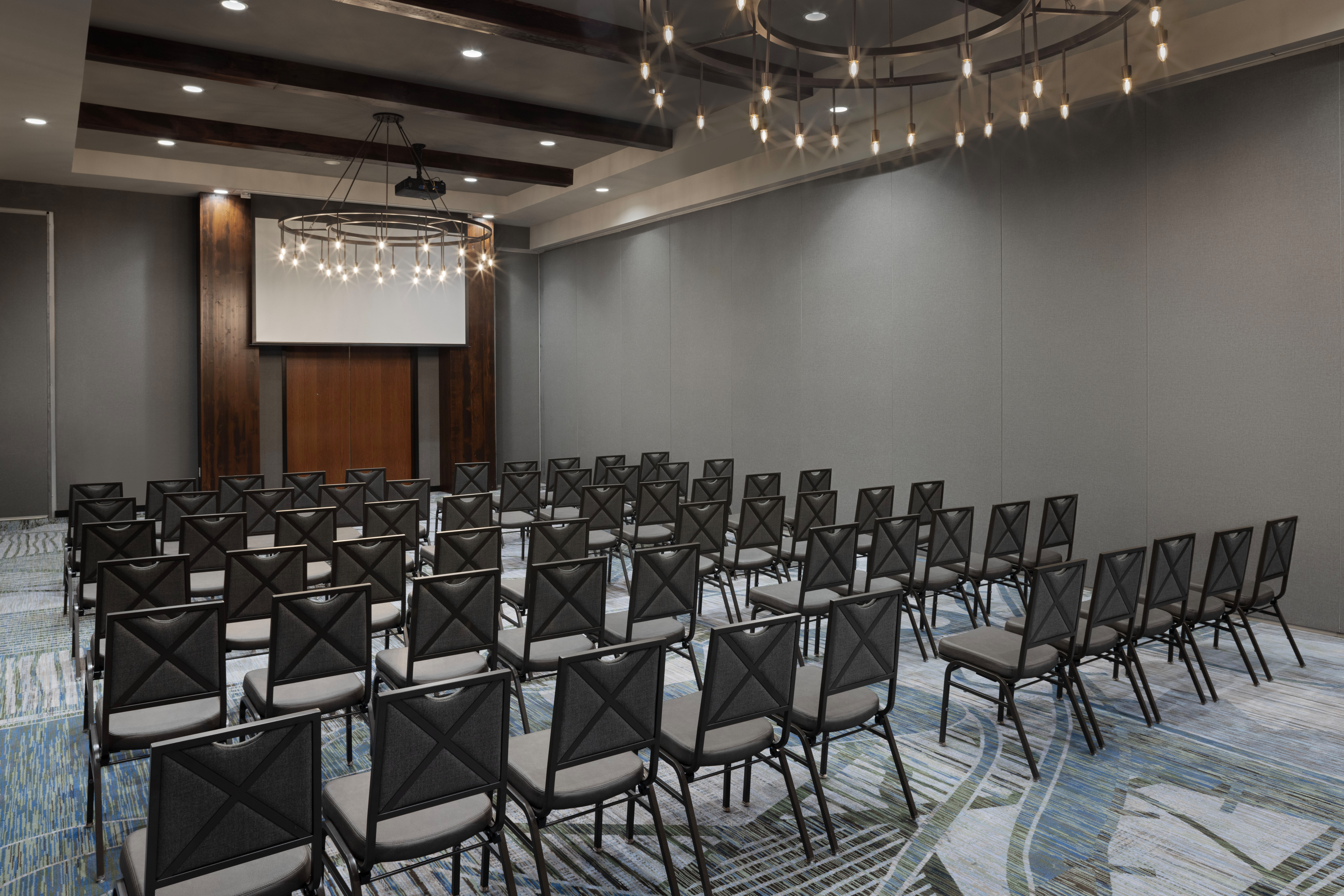 Mid-size hotel meeting room set up with theatre-style seating at Embassy Suites Bowling Green