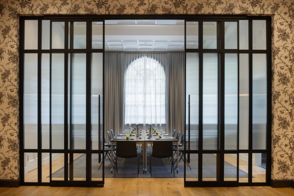 Newly renovated meeting room at DoubleTree Lexington with modern furnishings and flexible layout.