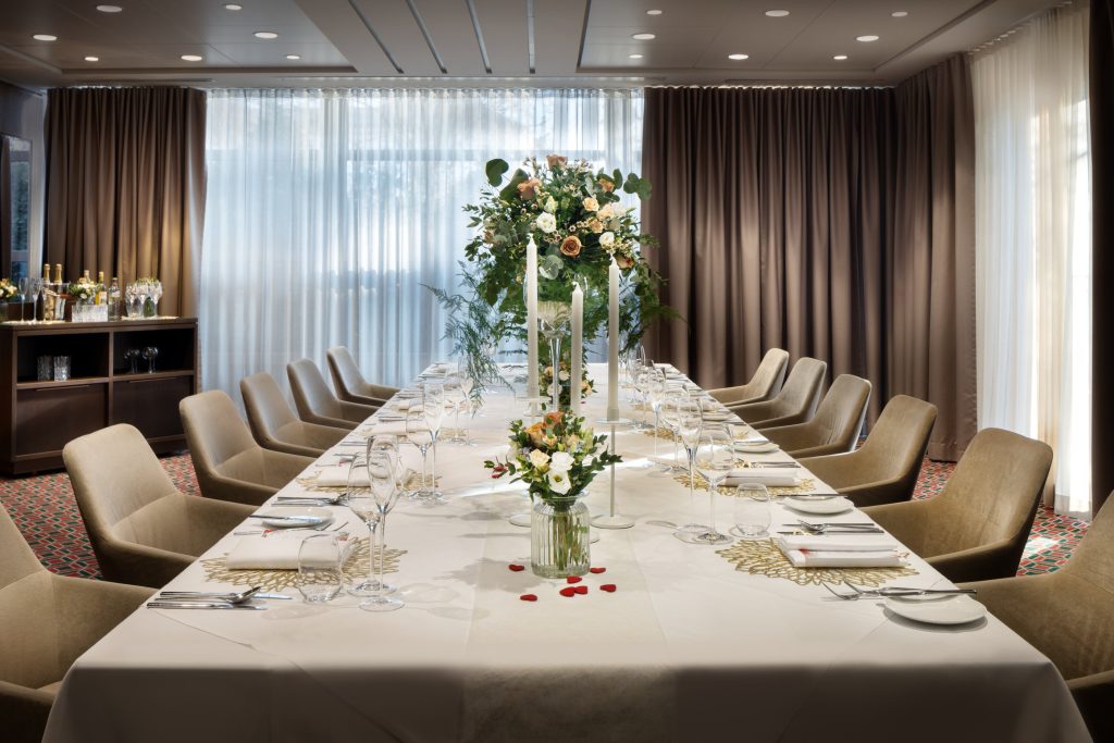 Banquet-style table with floral centrepiece at Sheraton Grand Salzburg