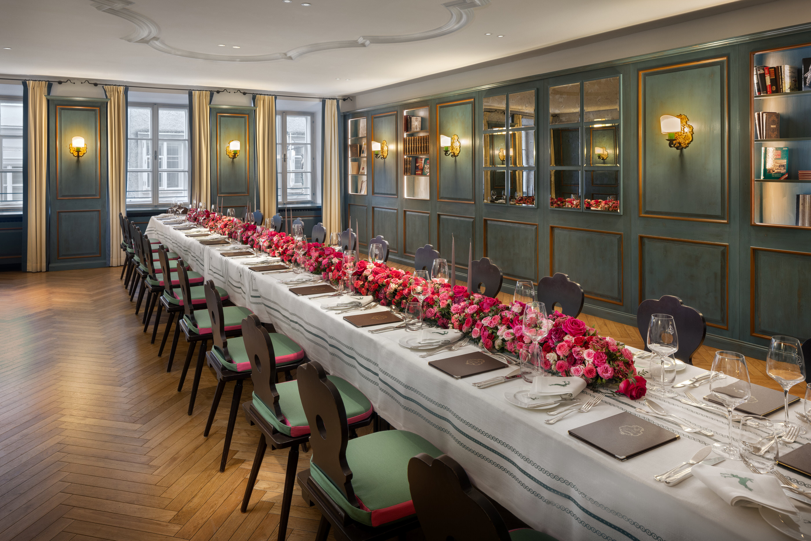 Wide-angle view of event setup in the Library Room of the Goldener Hirsch