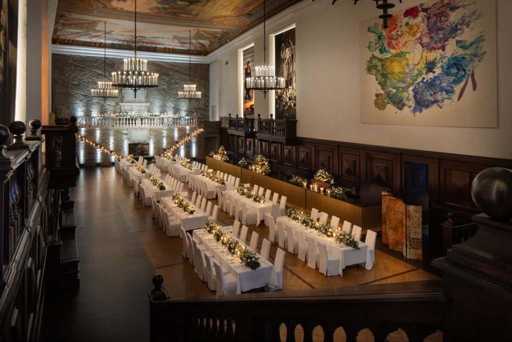 Candlelit event viewed from above inside the Salzburg Festival House