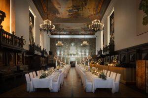 Grand banquet table in Karl Böhm Saal under ornate ceiling and chandeliers. A hard shot to get when time is tight