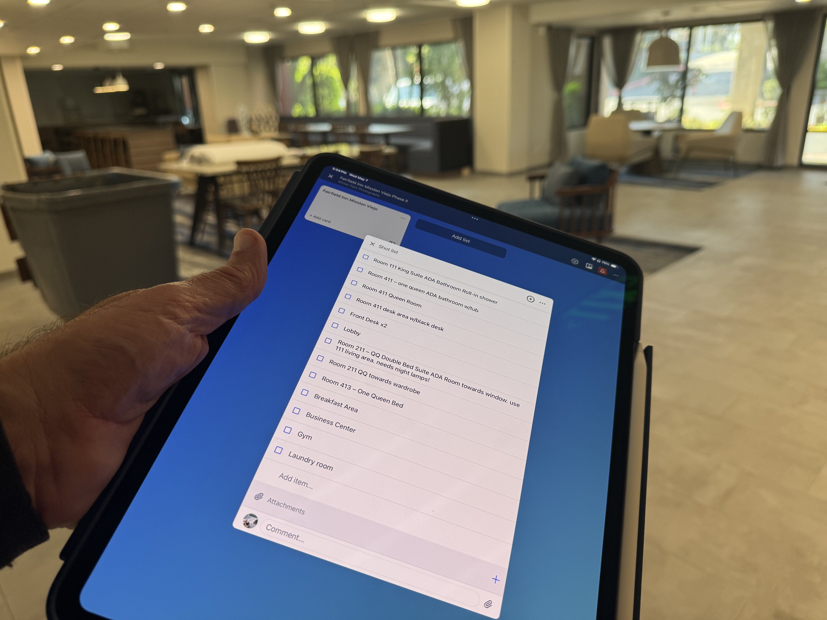 Hotel photo shoot checklist displayed on iPad during pre-shoot walkthrough