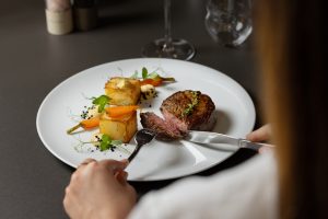 Dessert sauce pouring at Sheraton Grand Salzburg – premium F&B photography for luxury hotel dining