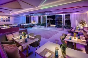 MB Hotel Miami Beach rooftop restaurant transformed with colourful evening event lighting