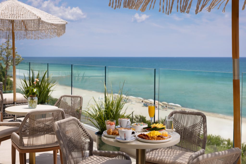 Breakfast table on the MB Hotel rooftop terrace overlooking Miami Beach and the Atlantic Ocean
